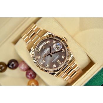 ĐỒNG HỒ ROLEX DAYDATE 118235 MẶT KHẢM ỐC TÍM VÀNG HỒNG NGUYÊN KHỐI 18K